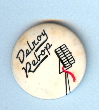 The rarer shorter red cable Delroy Rebop button. 